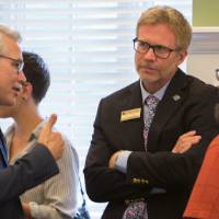 Loren Rullman, Vice Provost of Student Affairs speaks with Mark Schaub, Director of the Padnos International Center.